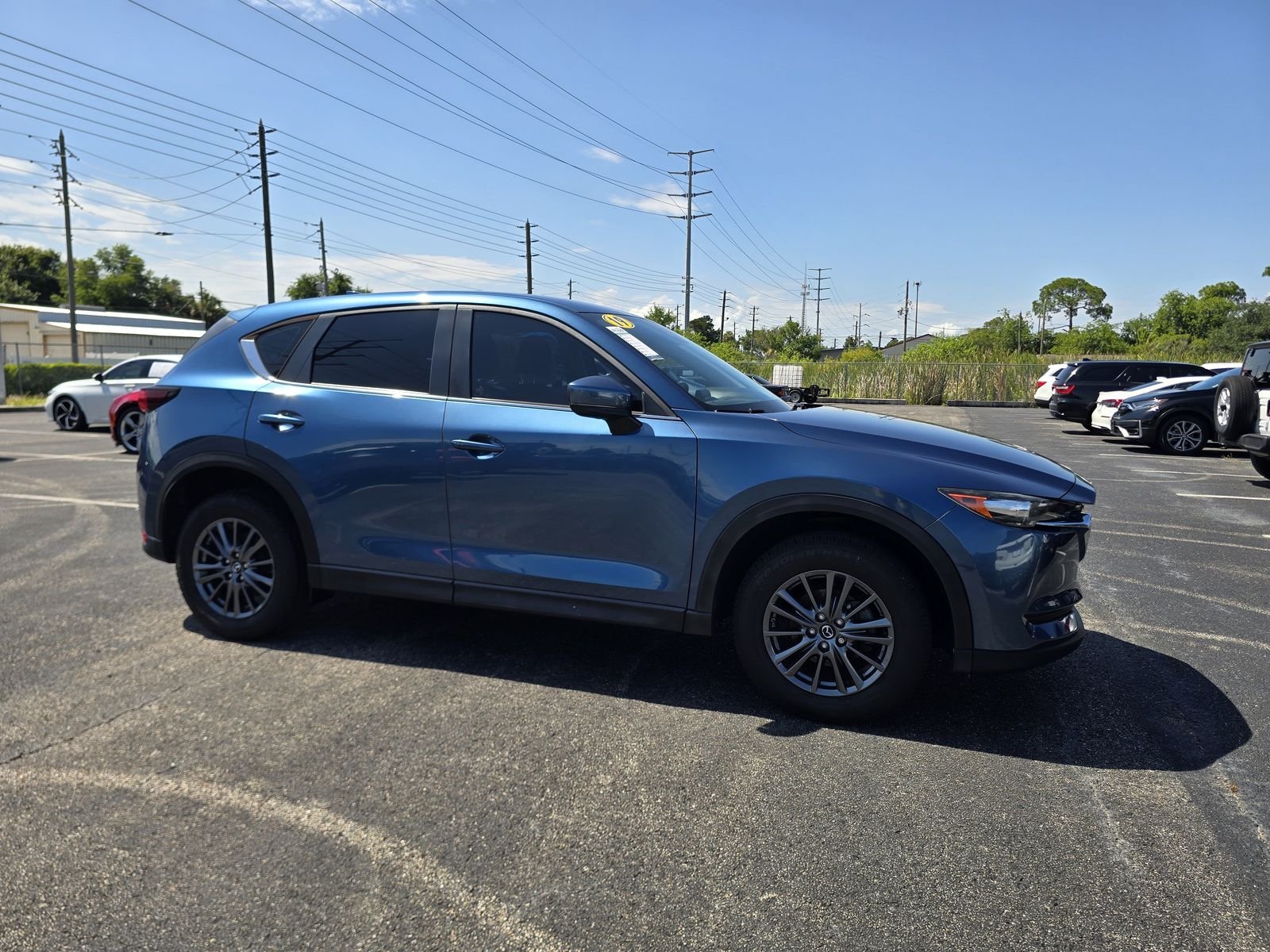 Used 2019 Mazda CX-5 Sport with VIN JM3KFABM3K0621997 for sale in Port Richey, FL
