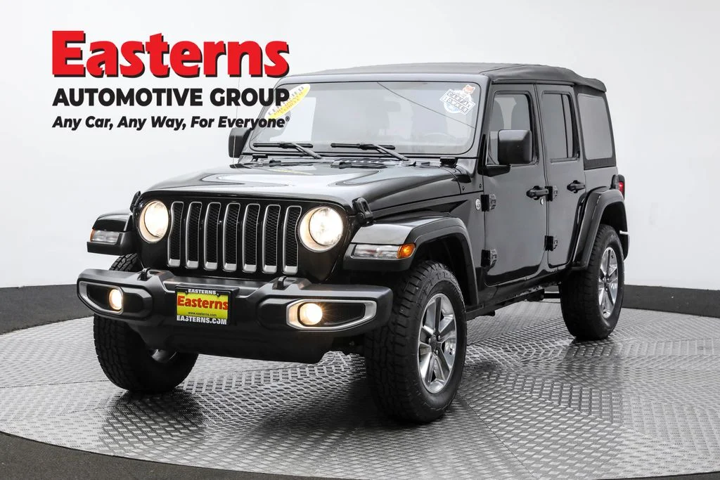Used 2021 Black Jeep Unlimited Sahara image 1