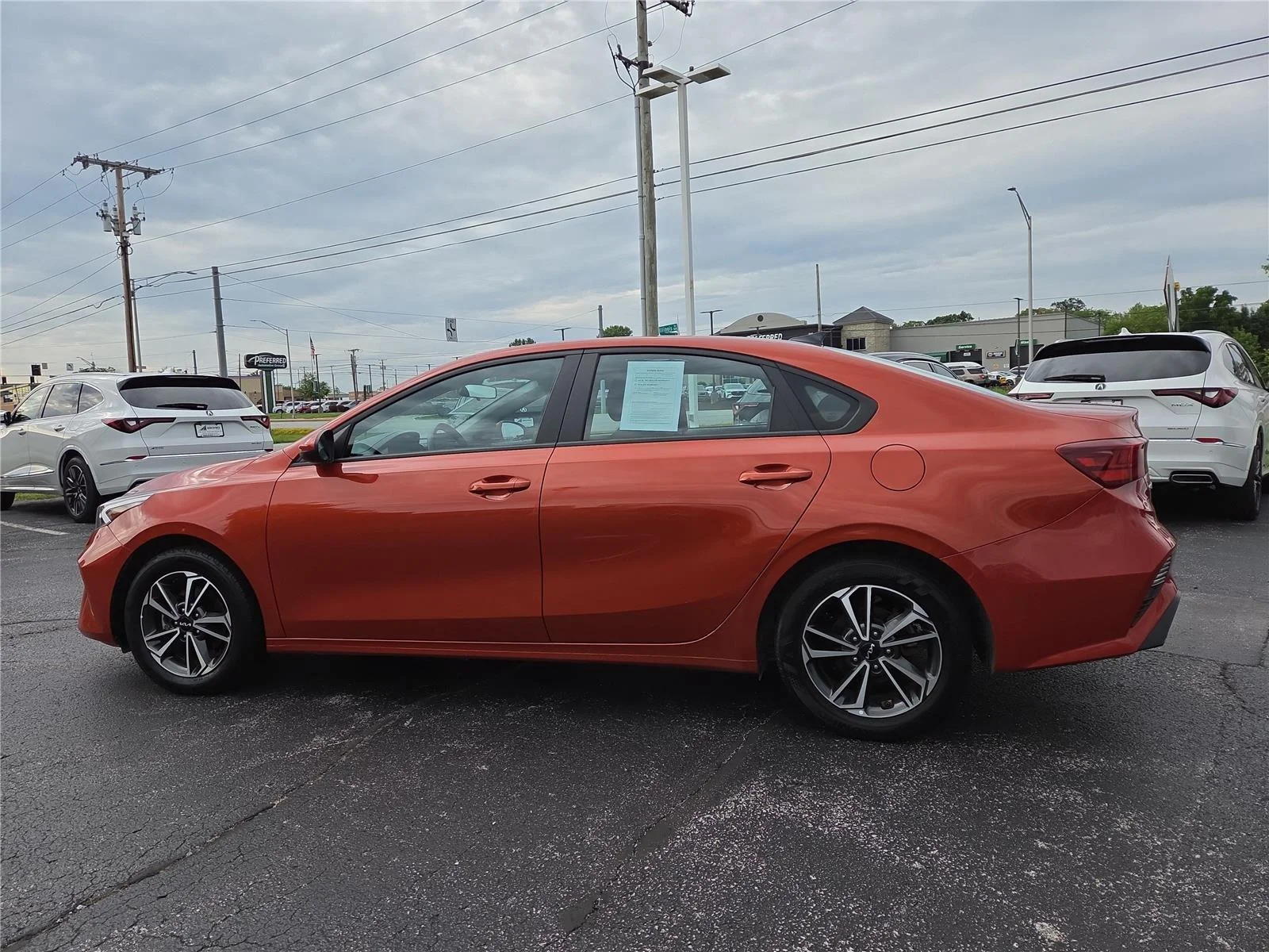 Used 2023 Fire Orange Kia LXS image 26