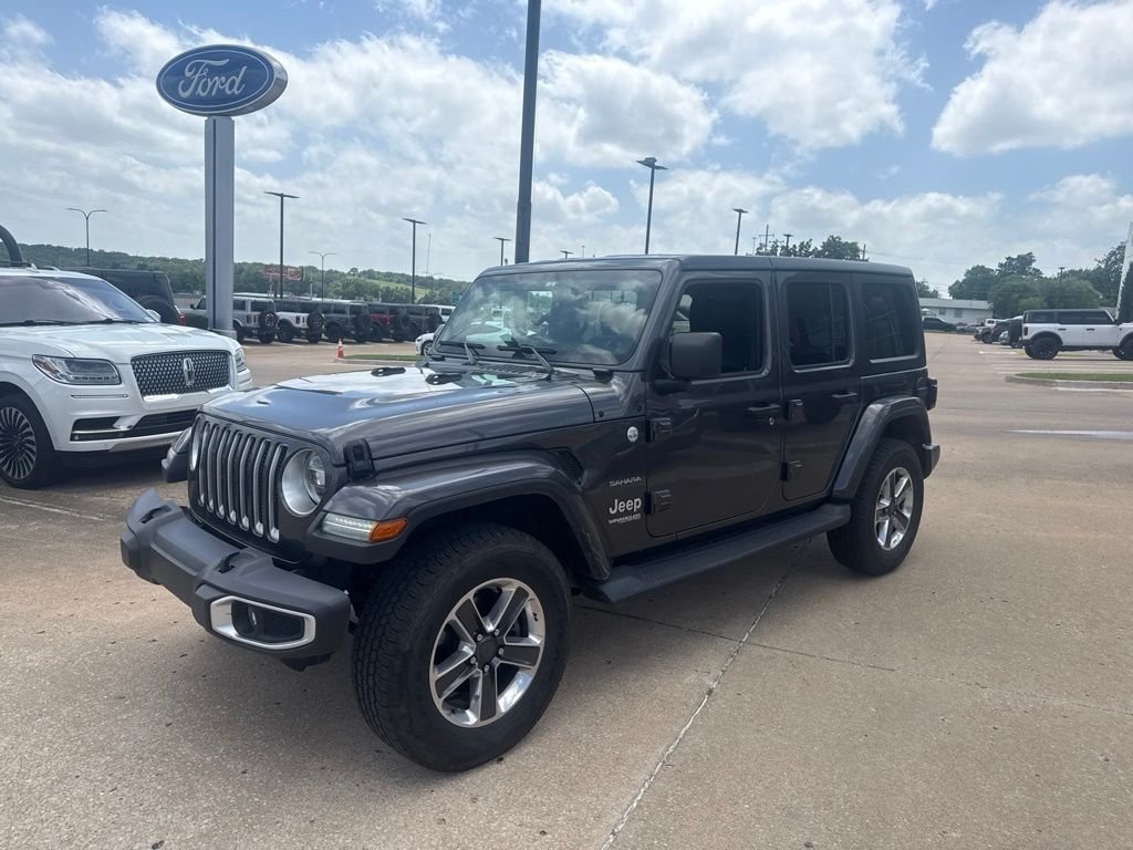 Used 2019 Granite Crystal Clearcoat Metallic Jeep Unlimited Sahara image 6