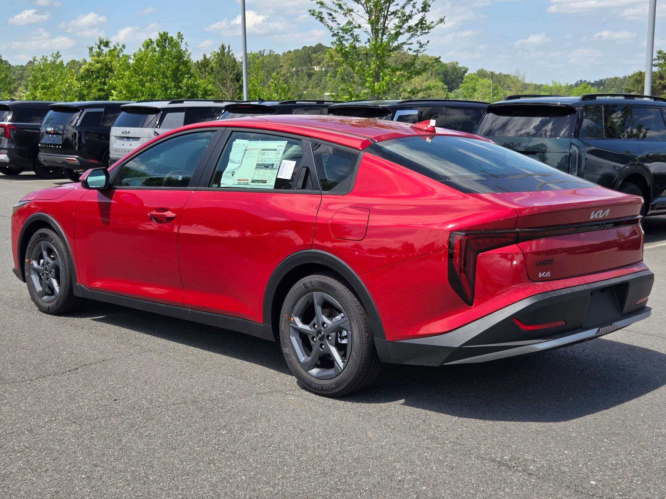New 2026 Currant Red Kia LXS image 5