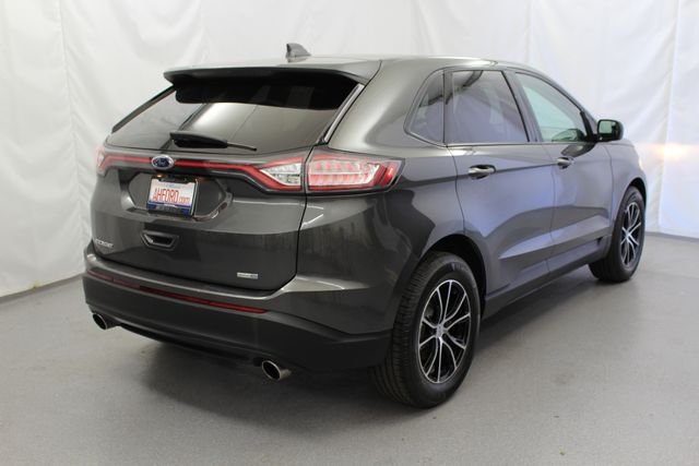 Used 2016 Magnetic Metallic Ford SE image 7