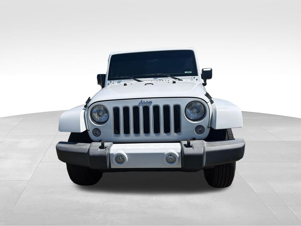 Used 2016 White Jeep Unlimited Sahara image 8