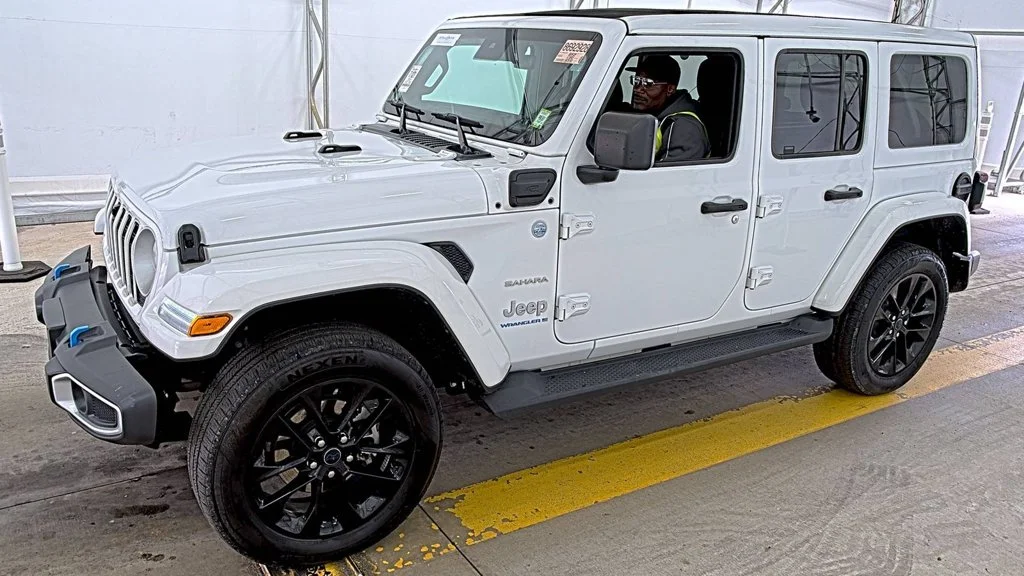 Used 2024 White Jeep Sahara 4xe image 1