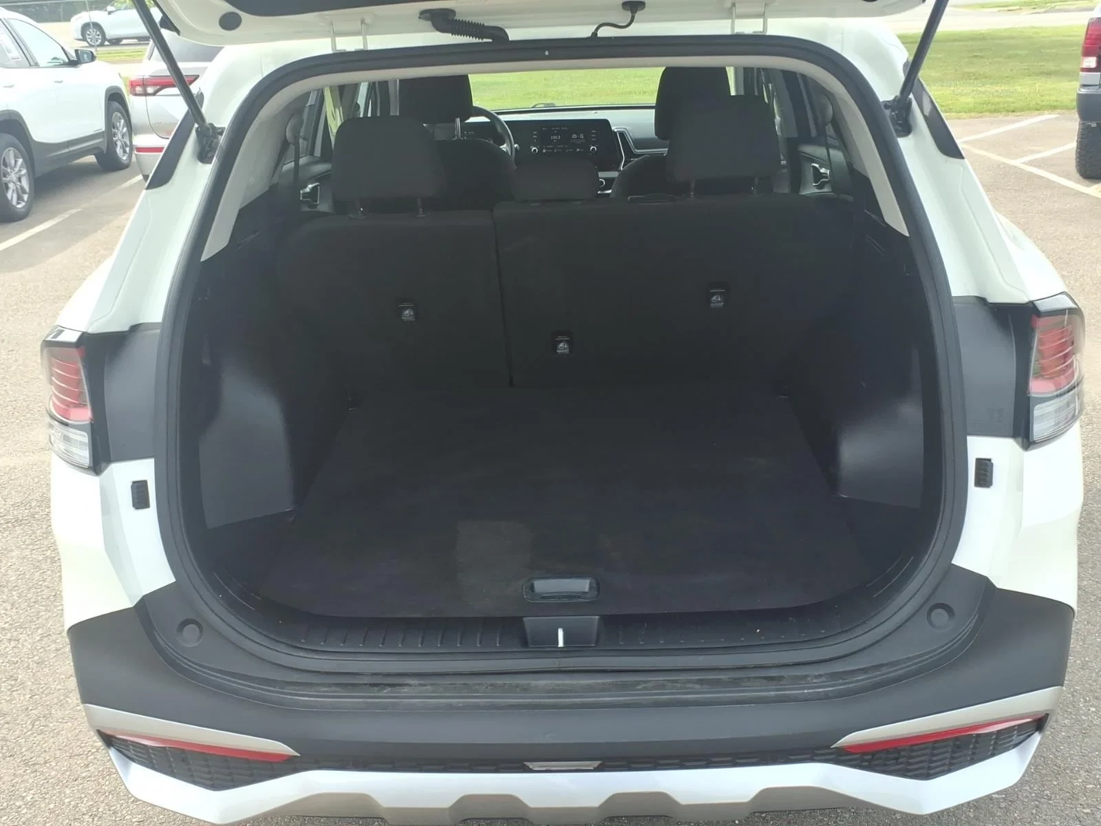 Used 2024 Snow White Pearl Kia LX image 9