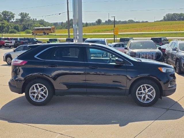 Used 2024 Agate Black Metallic Ford SEL image 8