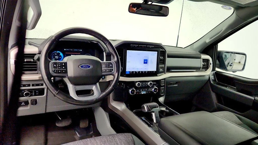 Used 2023 Agate Black Metallic Ford XLT 4WD SuperCrew 5.5