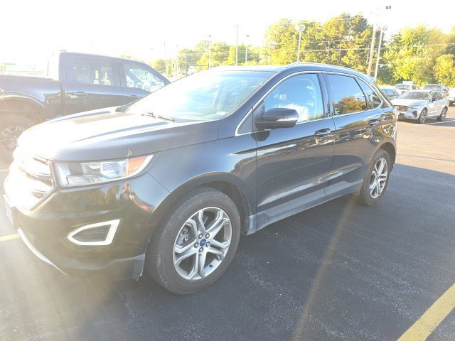 Used 2015 Black Ford Titanium image 1