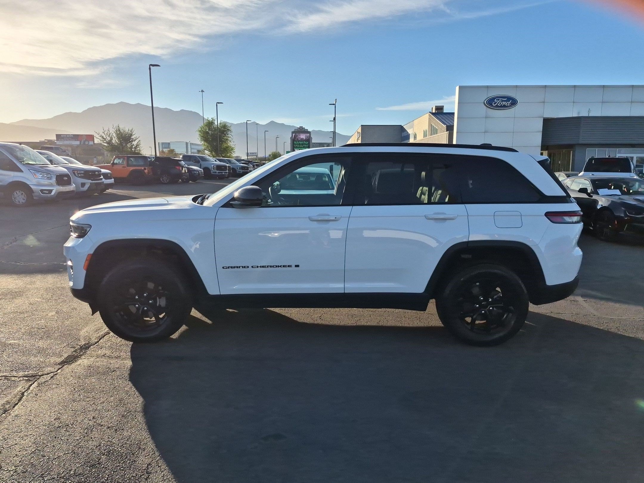 Used 2025 Bright White Clearcoat Jeep Altitude image 7