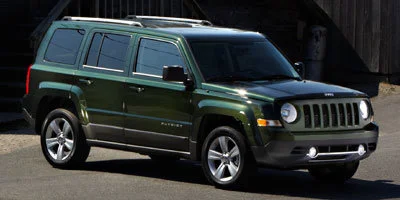 Used 2012 Mineral Gray Metallic Jeep Sport image 1