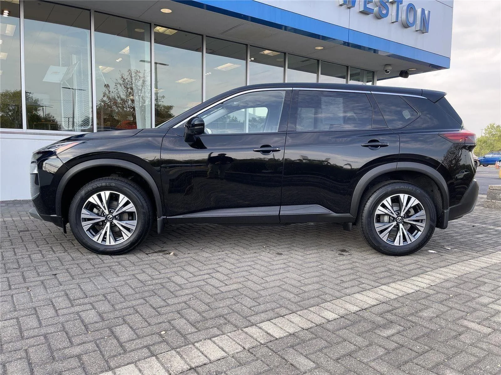 Used 2021 Black Nissan SV Intelligent AWD image 2