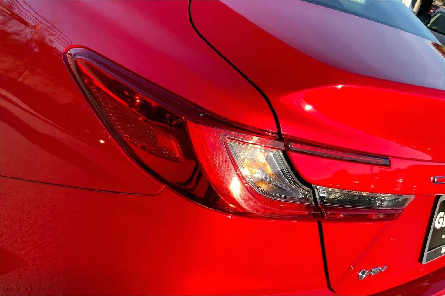 Used 2025 Supersonic Red Toyota LE image 28