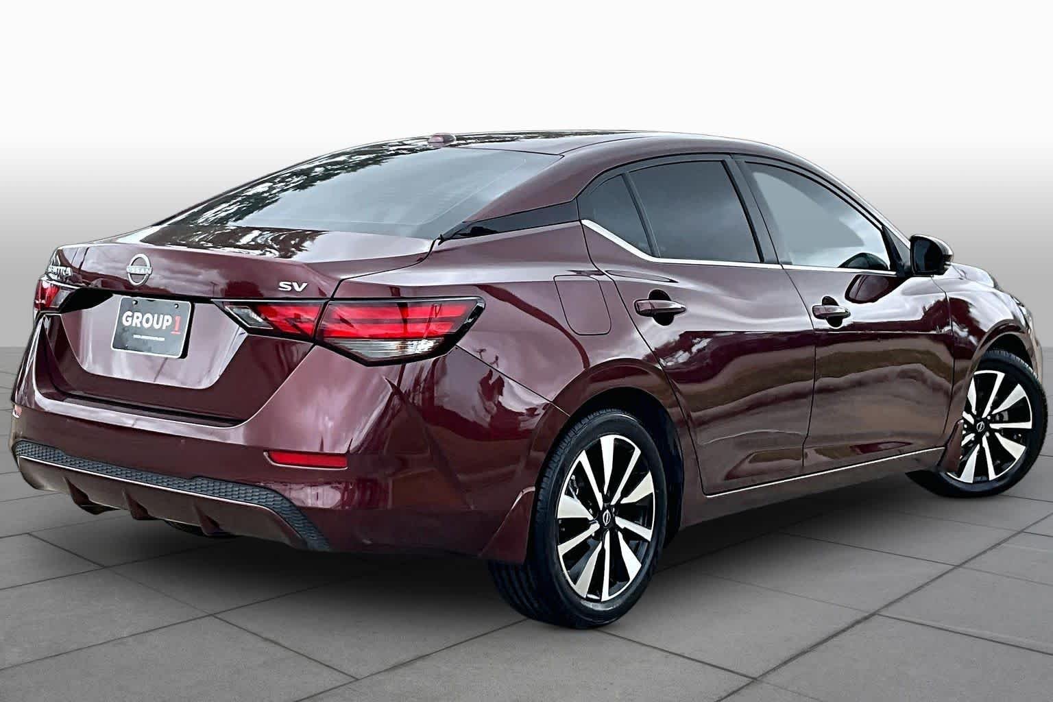 Used 2024 Rosewood Metallic Nissan SV image 13