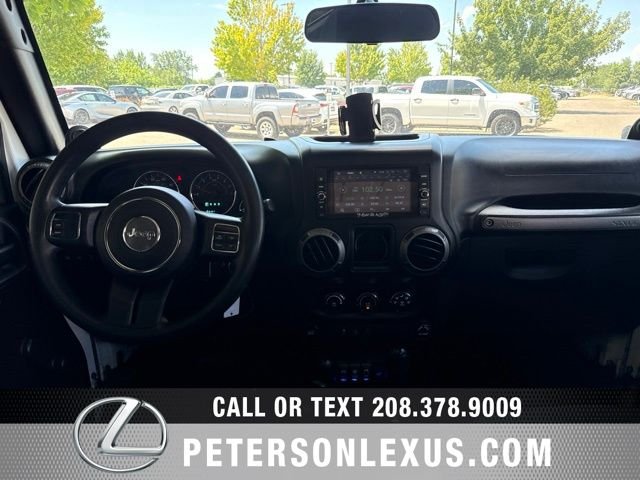 Used 2013 White Jeep Unlimited Sport image 14