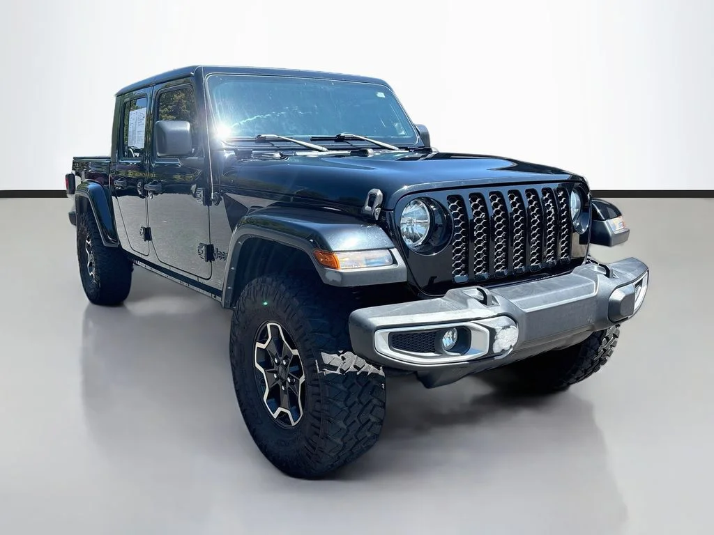 Used 2022 Black Clearcoat Jeep Sport image 1
