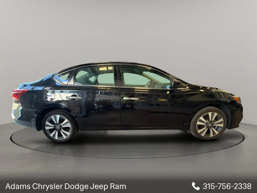 Used 2019 Black Nissan SV image 4