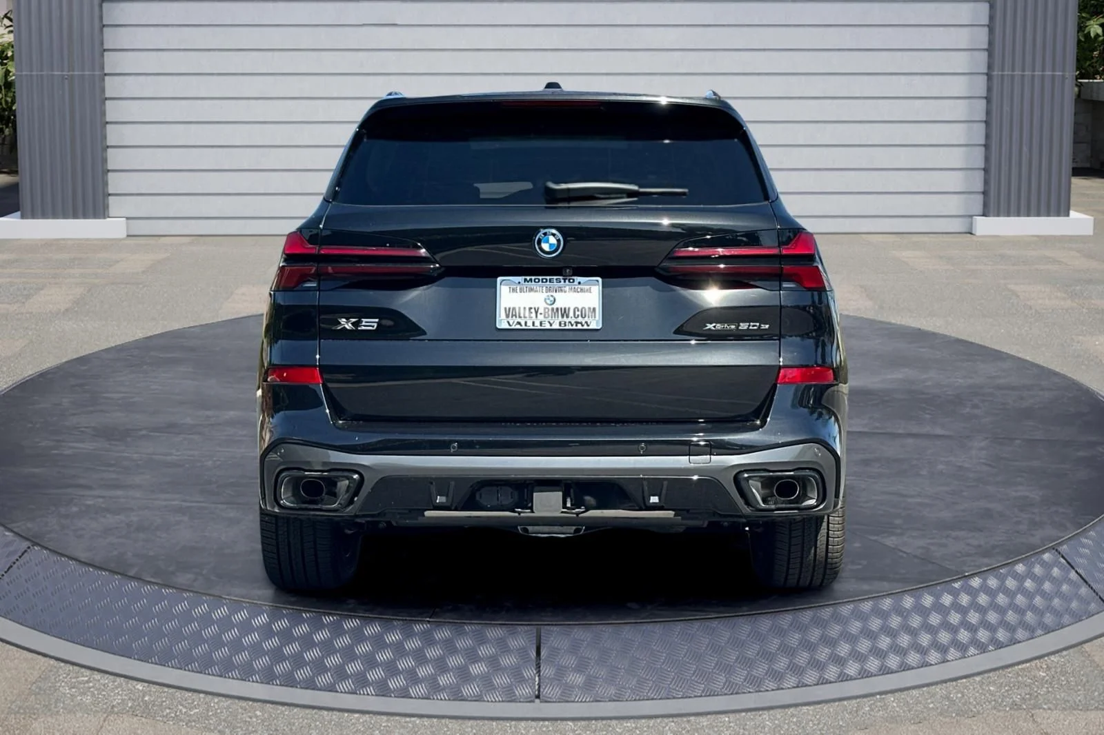 New 2026 Black Sapphire Metallic BMW xDrive50e image 5