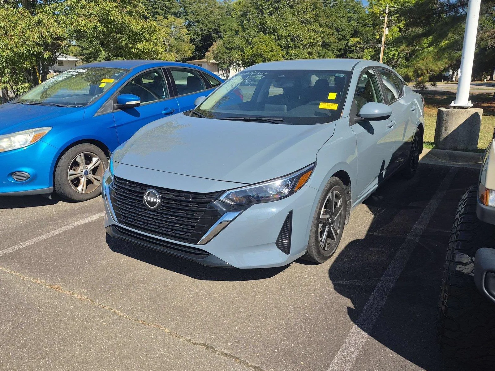 Used 2024 Atlantic Gray Metallic Nissan SV image 1