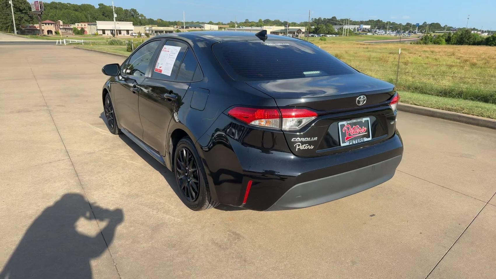 Used 2024 Midnight Black Metallic Toyota LE image 7