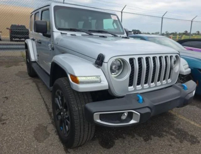 Used 2023 Silver Jeep Sahara 4xe image 1