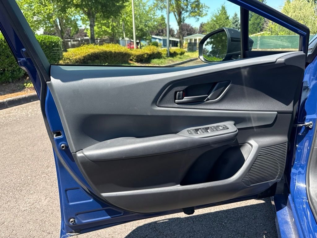 Used 2025 Reservoir Blue Toyota LE image 18