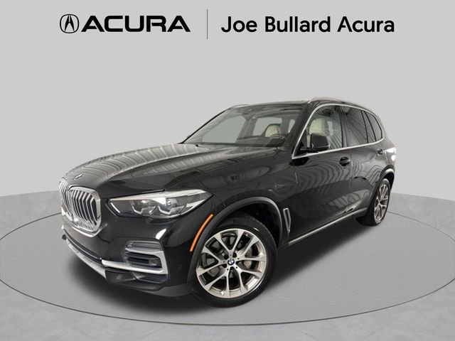 Used 2022 Black BMW sDrive40i image 1