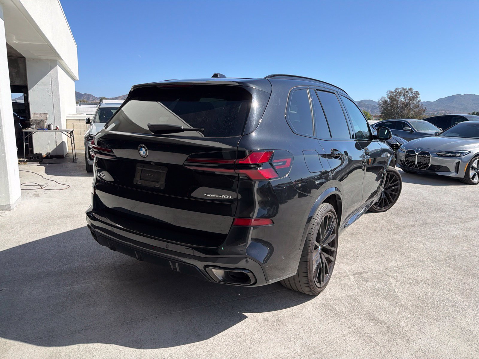 Used 2024 Black Sapphire Metallic BMW sDrive40i image 4
