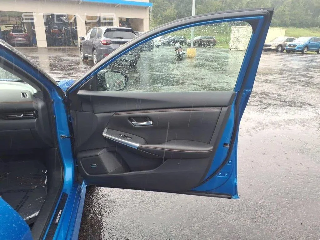 Used 2025 Electric Blue Metallic/Super Black Nissan SR image 19