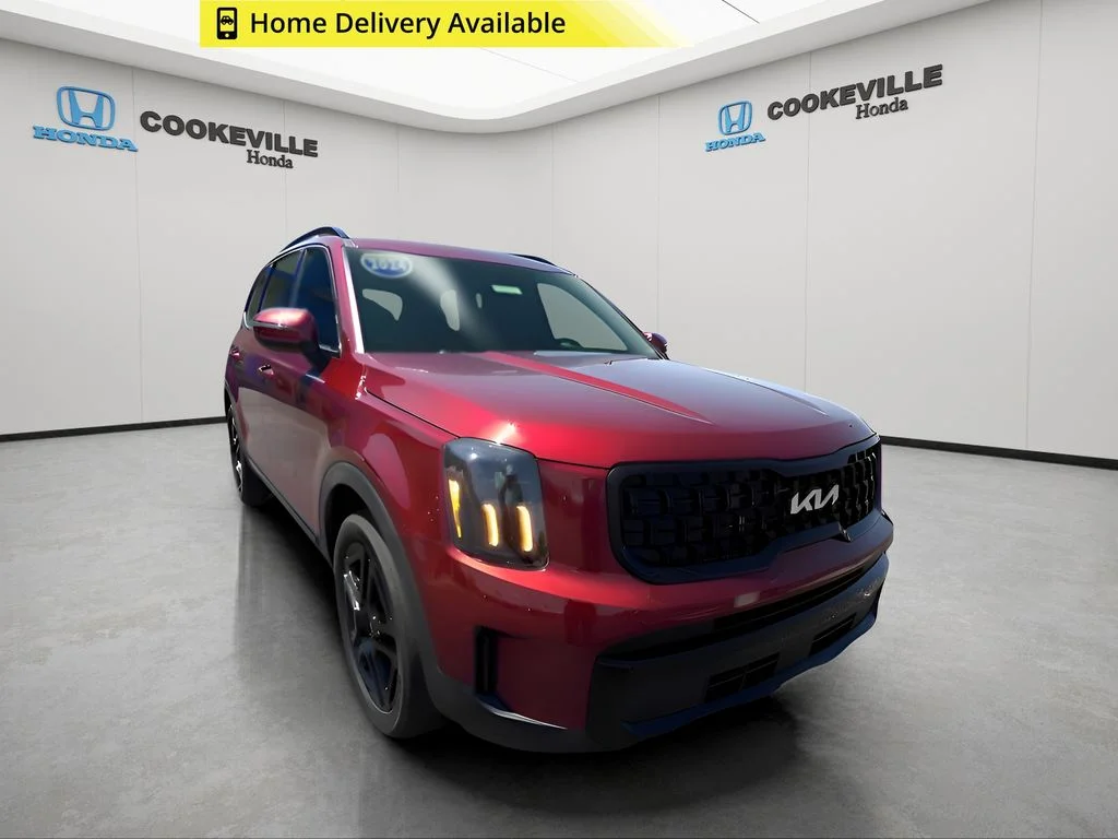 Used 2024 Dawning Red Kia EX X-Line image 1