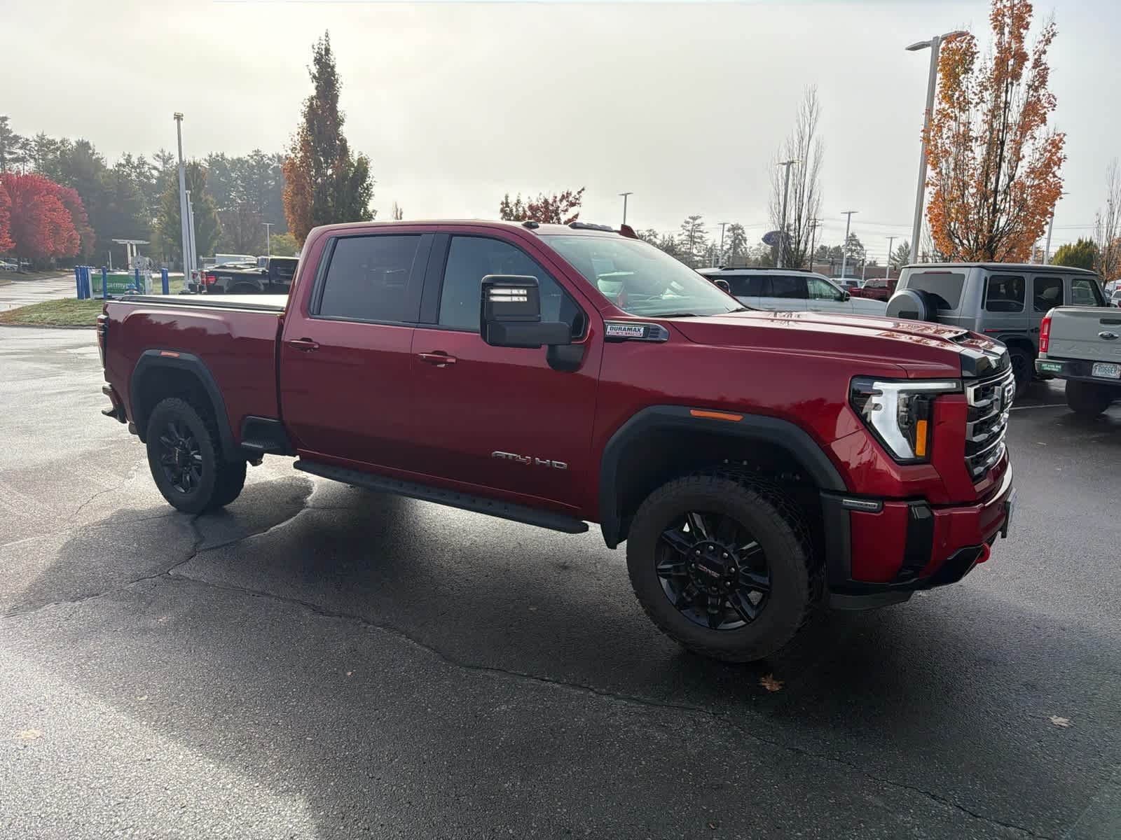 Used 2025 Volcanic Red Tintcoat GMC AT4 image 6