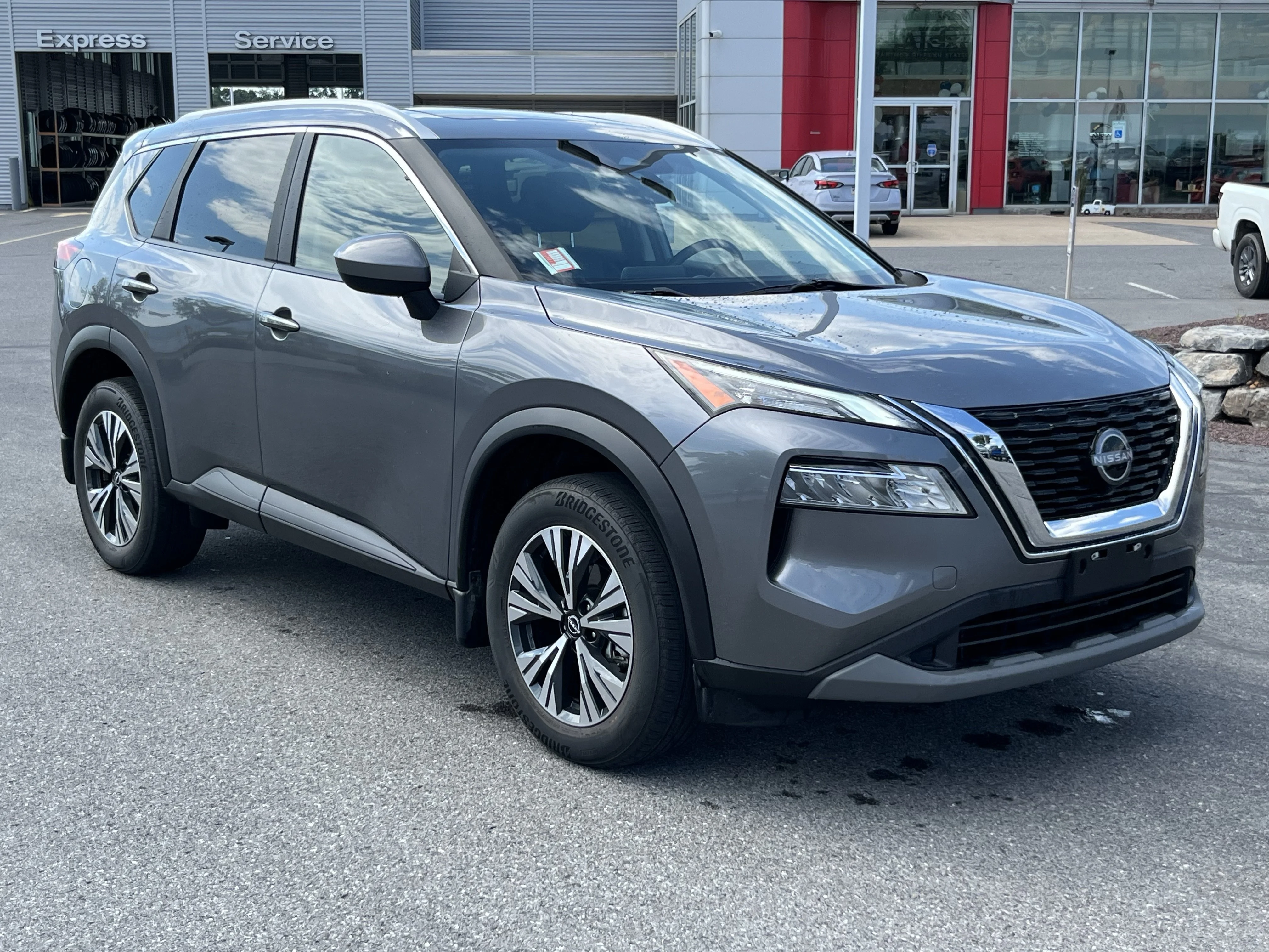 Used 2023 Gun Metallic Nissan SV image 1