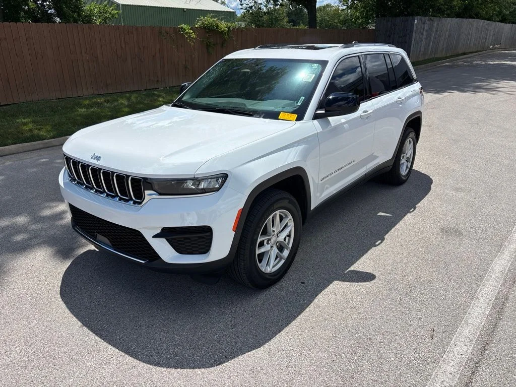 Used 2023 Bright White Clearcoat Jeep Laredo image 1