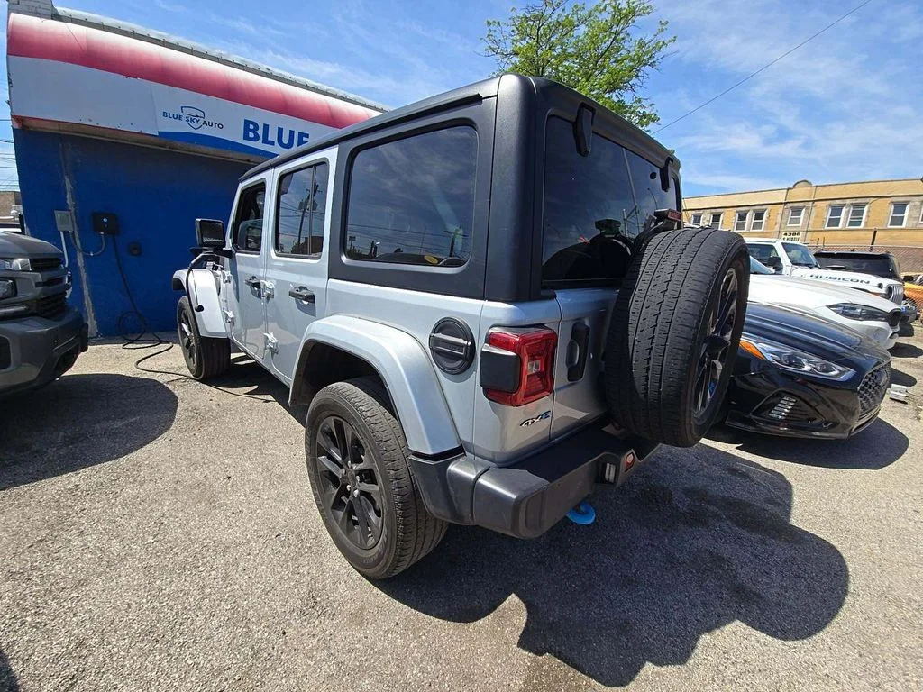 Used 2023 Silver Jeep Sahara 4xe image 4