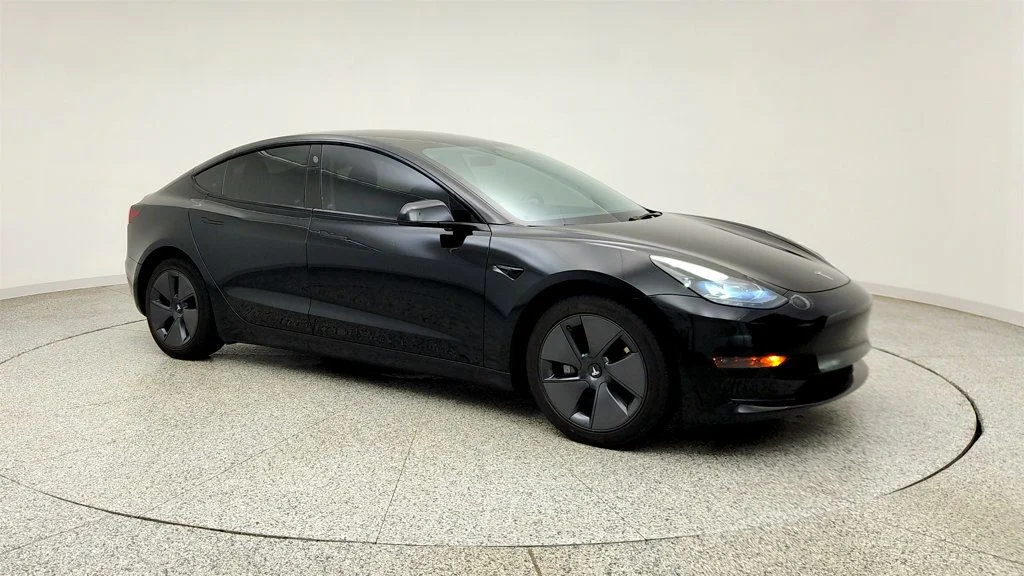 Used 2023 Solid Black Tesla RWD image 3