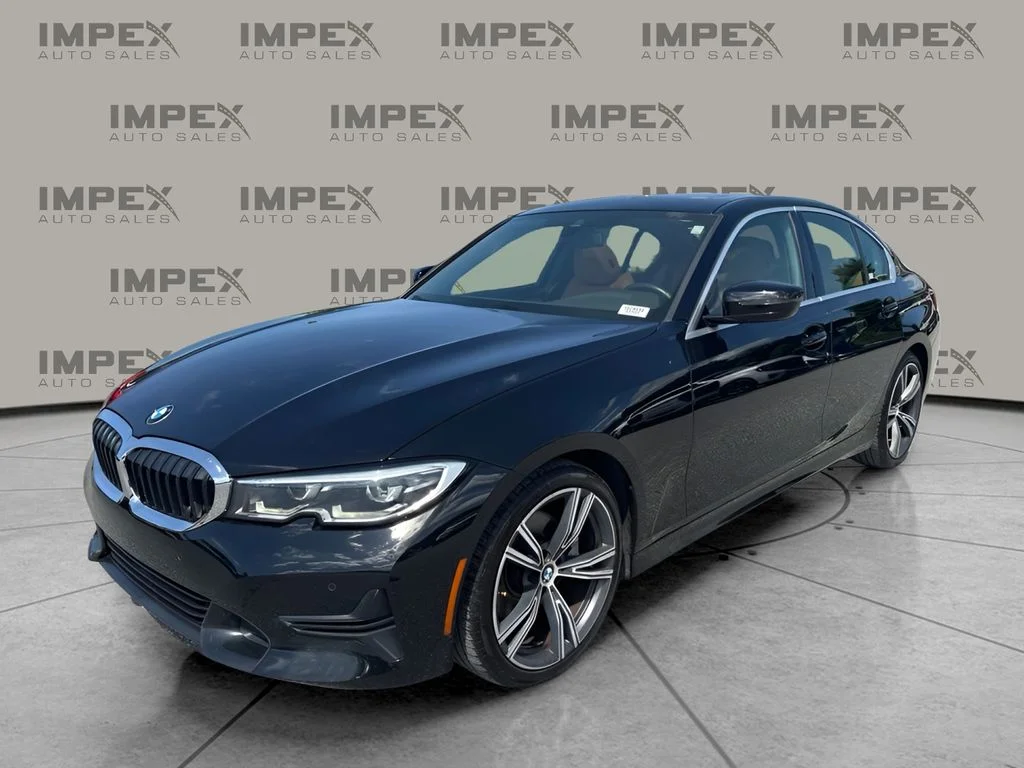 Used 2020 Black BMW 330i image 1