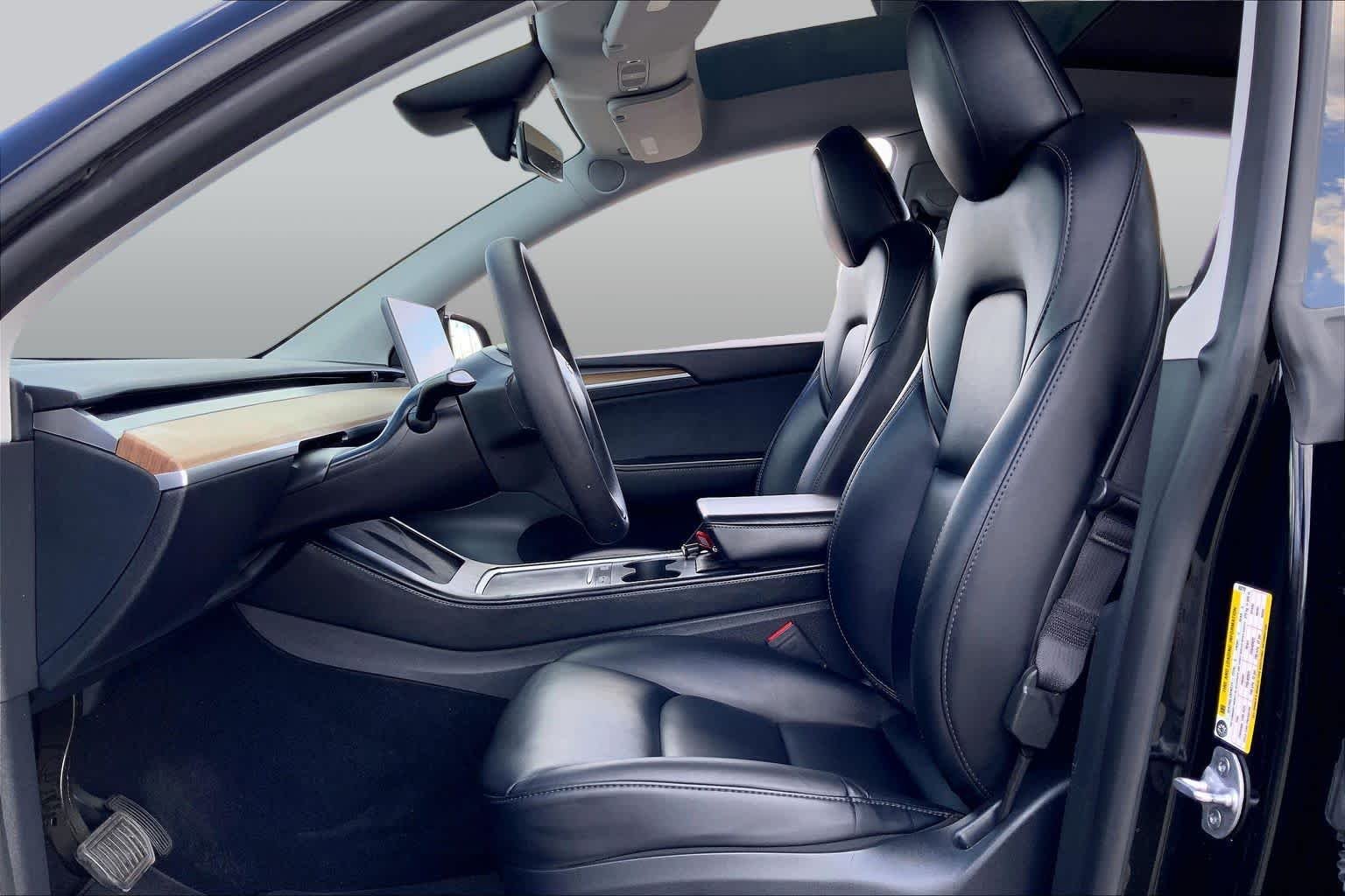 Used 2024 Solid Black Tesla  image 7