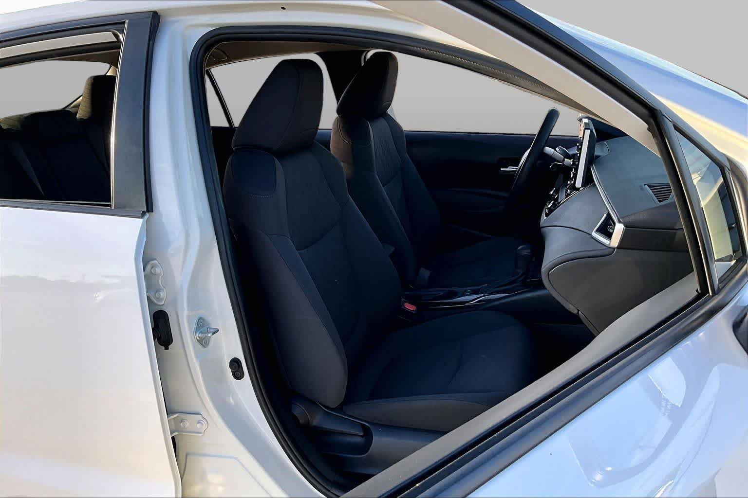 Used 2021 Super White Toyota LE image 9
