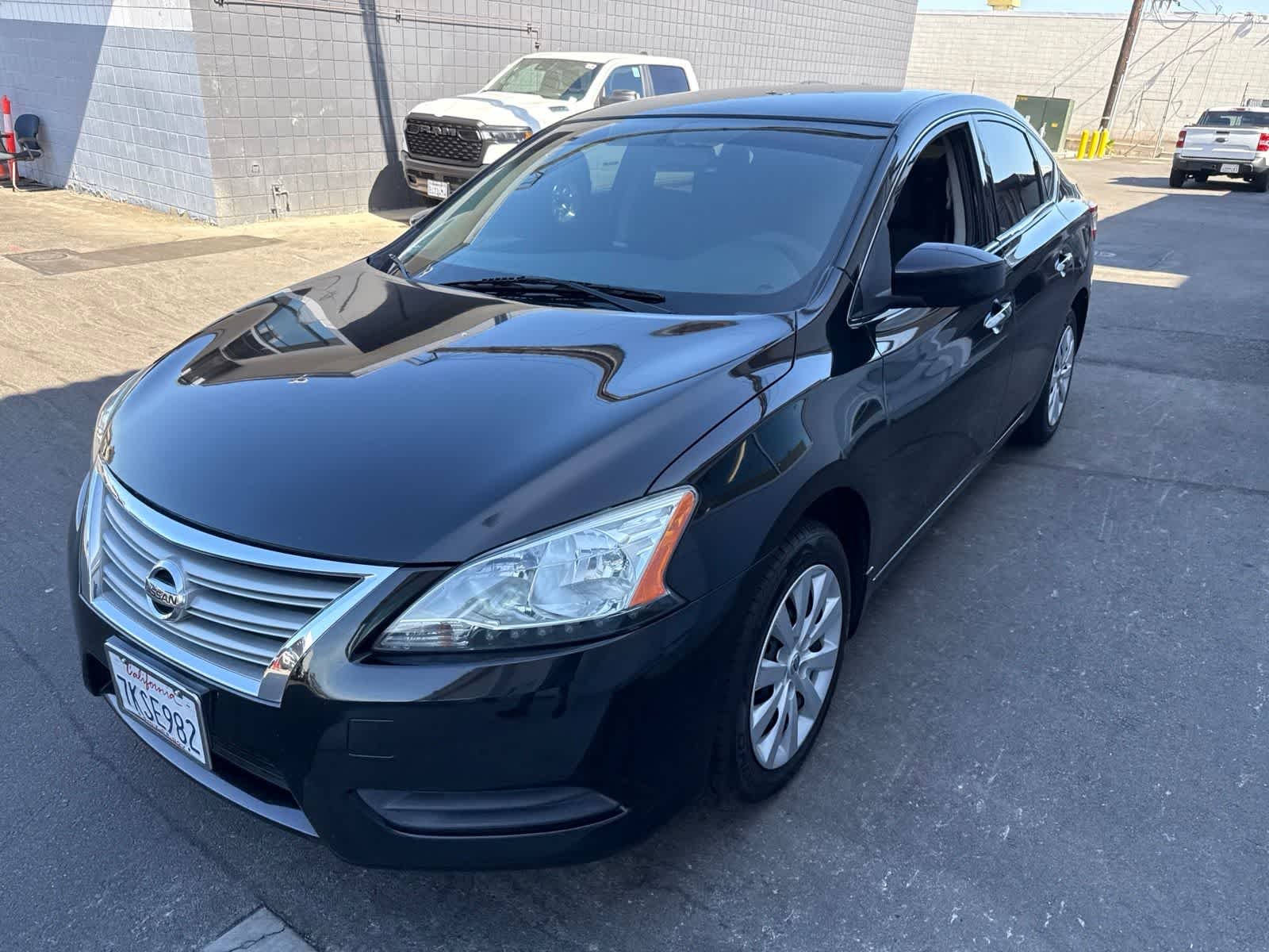 Used 2014 Super Black Nissan S image 2