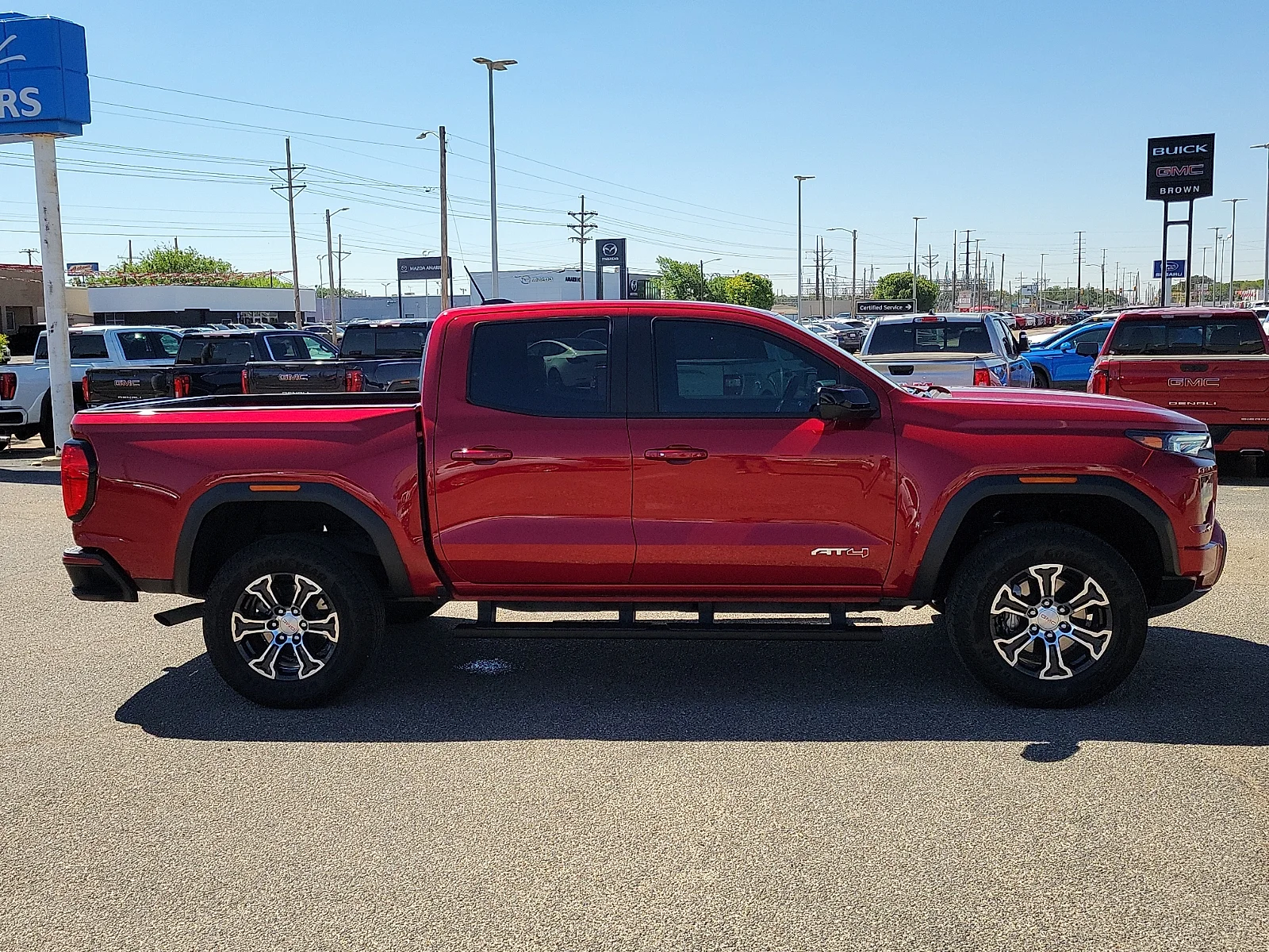 Certified Used 2024 Volcanic Red GMC 4WD AT4 image 12