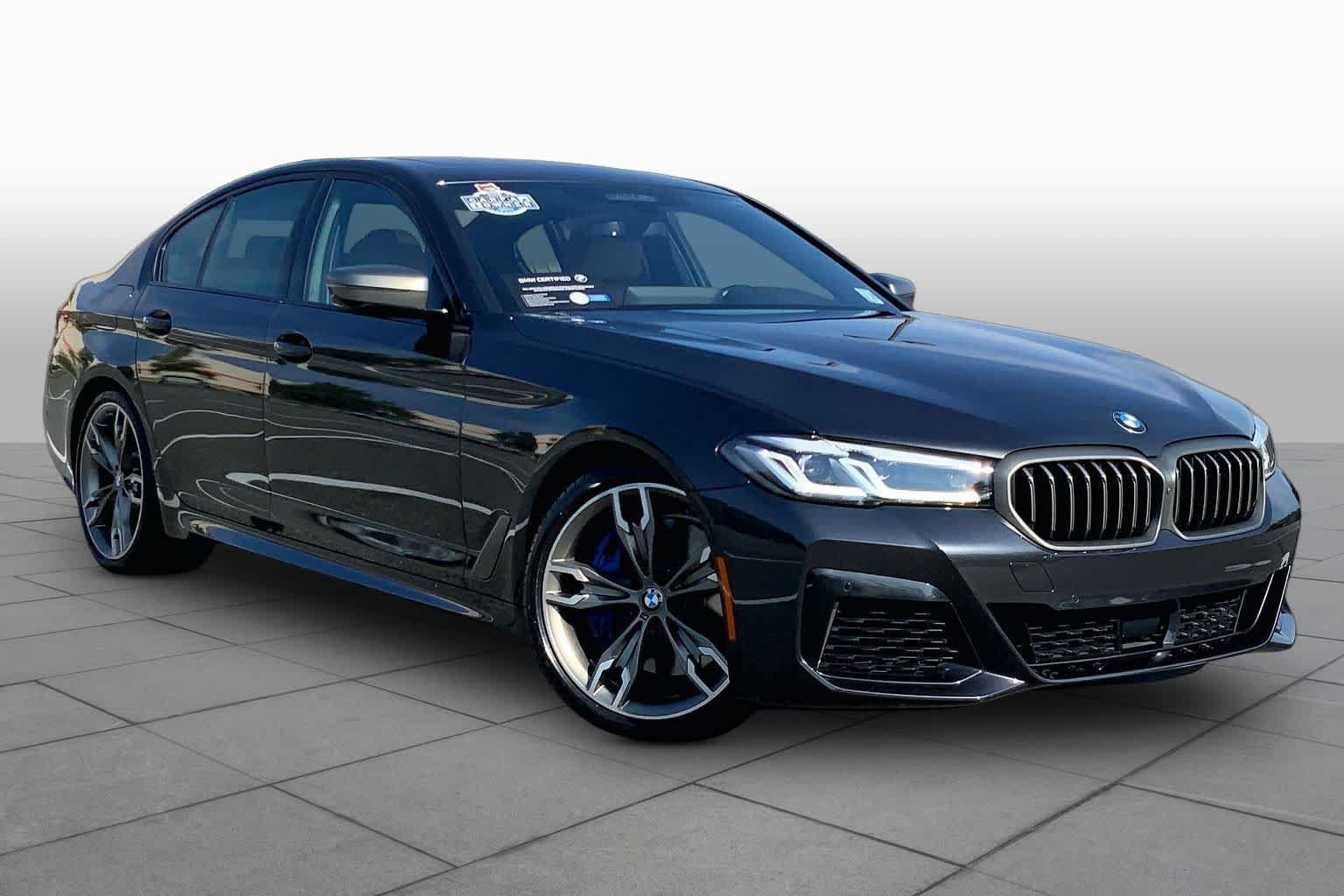 Certified Used 2023 Dark Graphite Metallic BMW M550i xDrive image 2