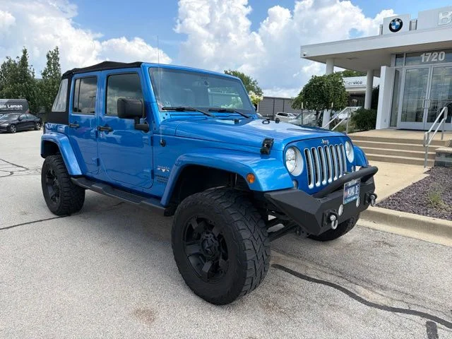 Used 2016 Blue Jeep Unlimited Sahara image 2
