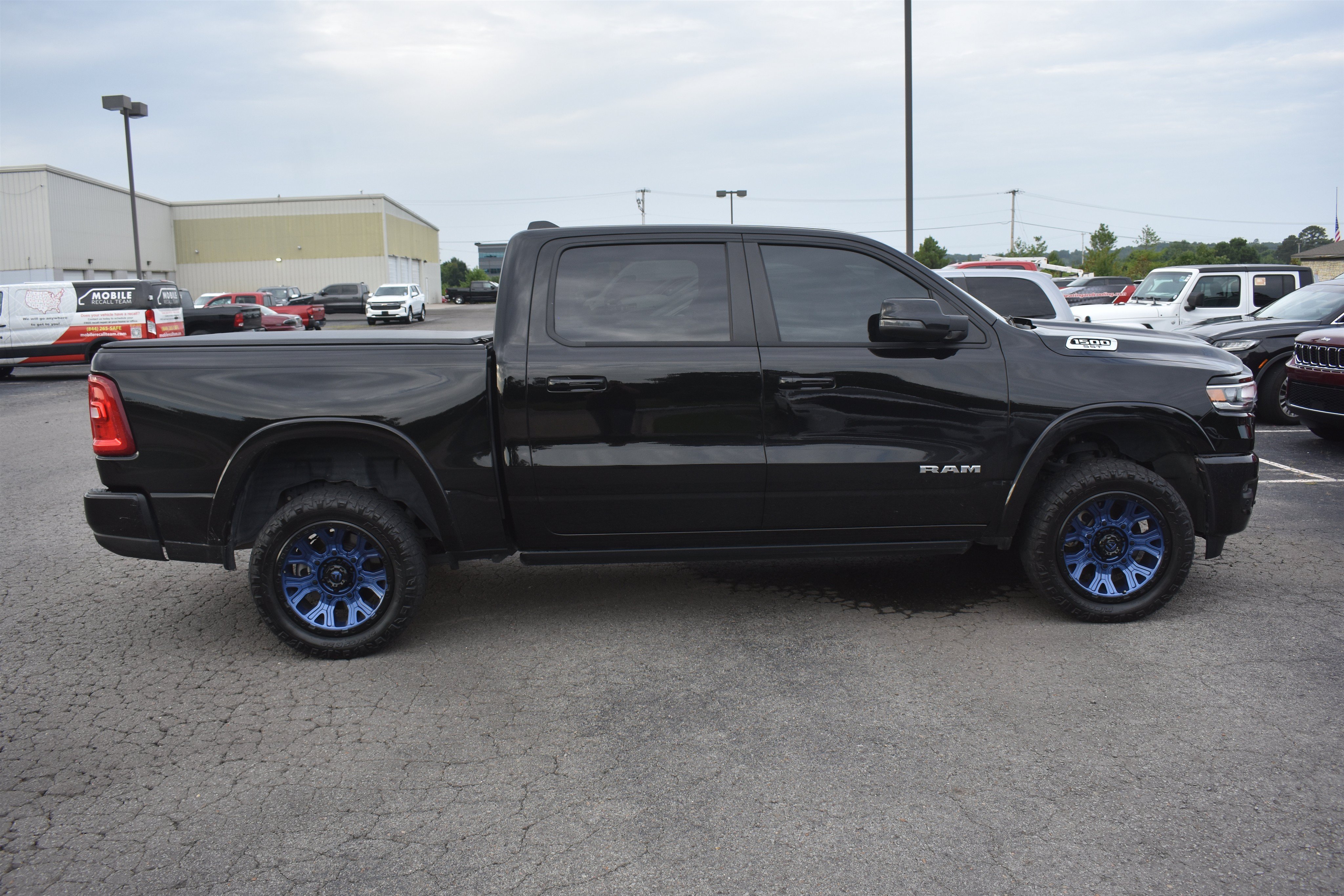 Used 2025 Diamond Black Crystal Pearlcoat Ram Laramie image 3