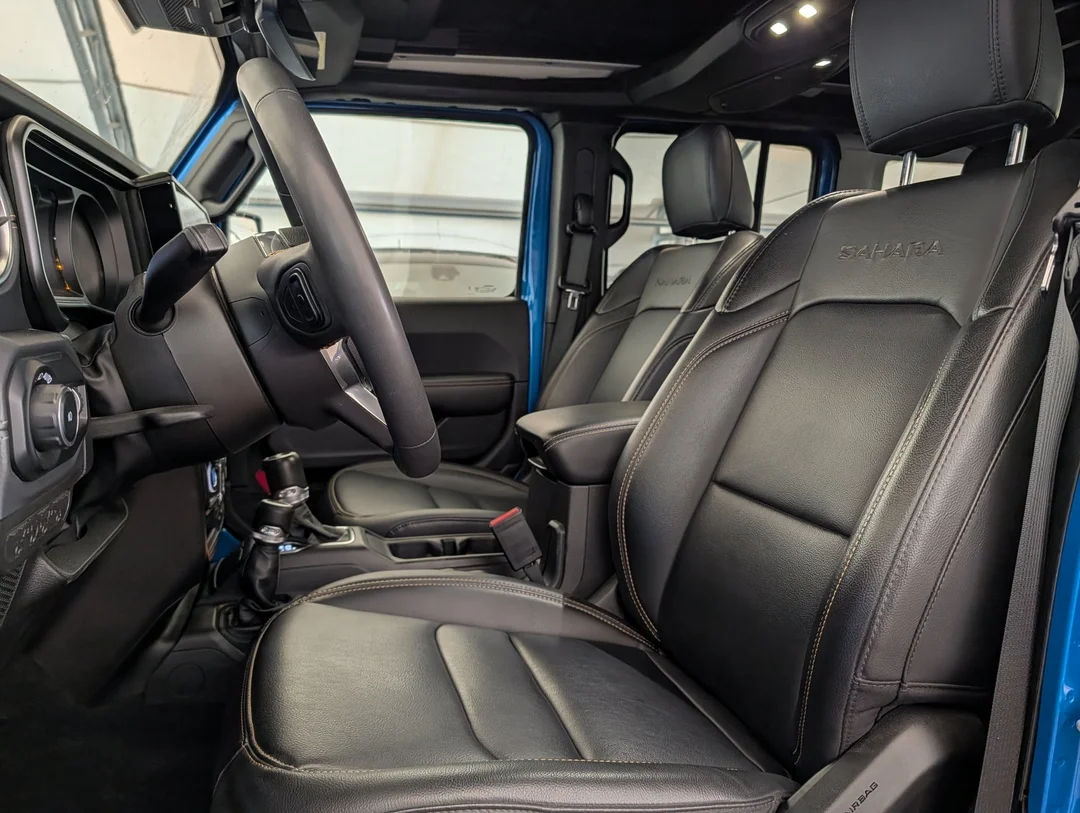 Used 2024 Blue Jeep Sahara - - 4x4 - Leather Seats - Power Soft Top - Remote Start & More! image 14