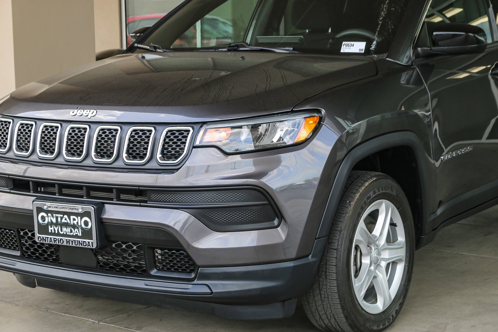 Used 2023 Granite Crystal Metallic Clearcoat Jeep Sport image 5