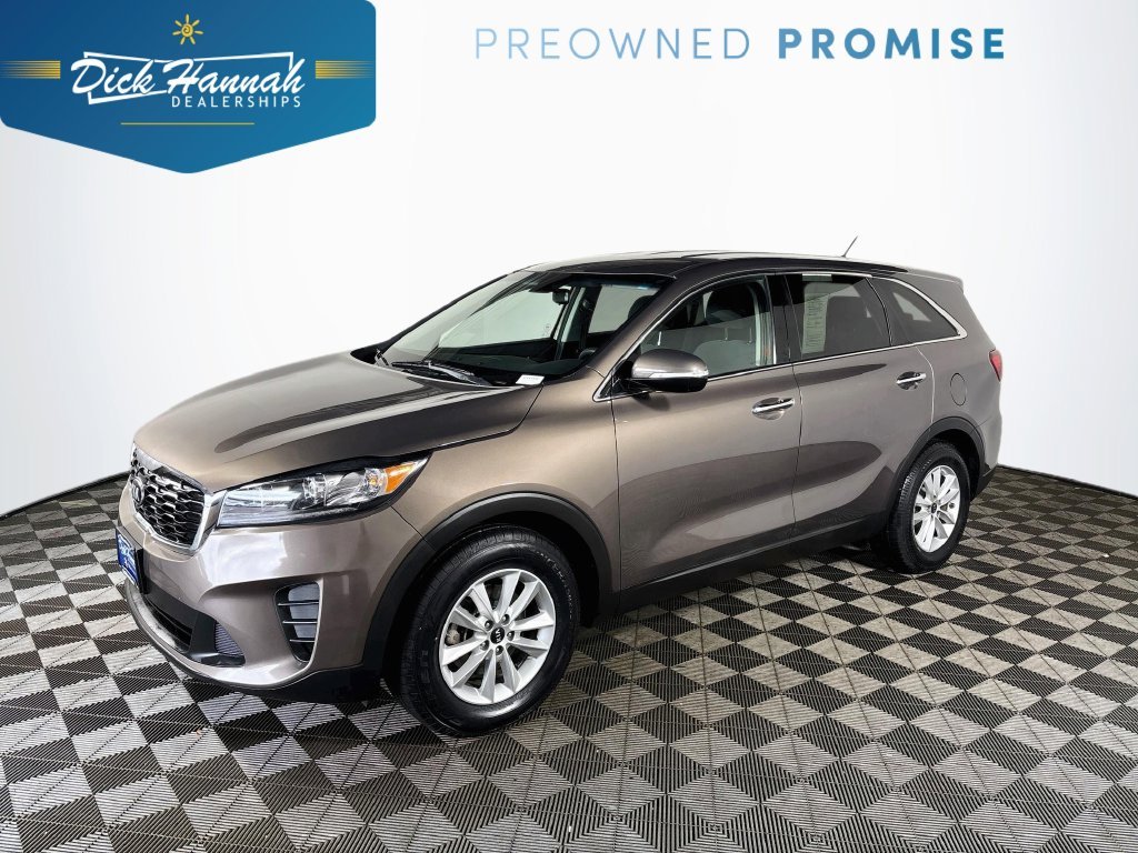 Used 2020 Brown Kia LX image 1