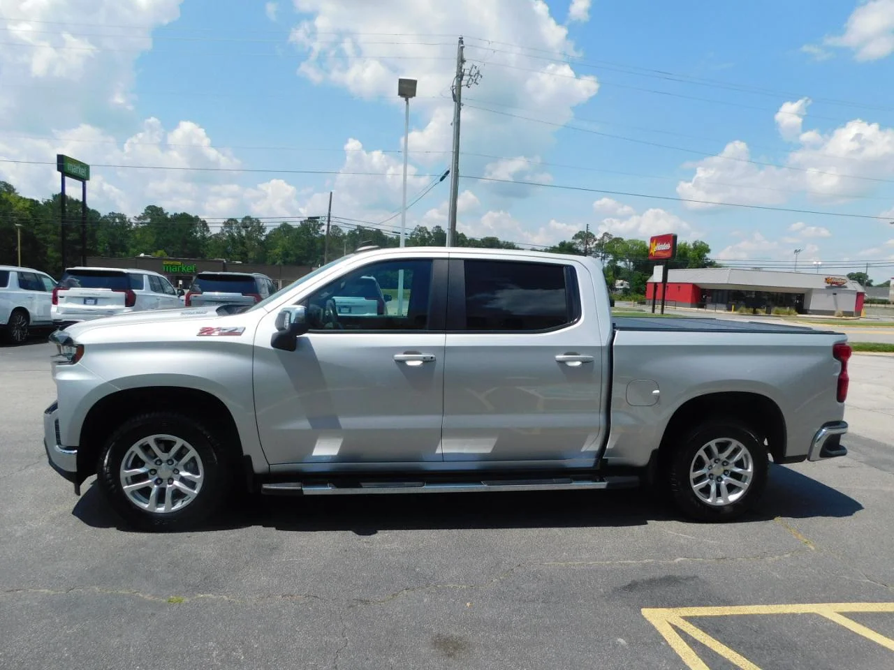 Used 2020 Silver Chevrolet 4WD CREW CAB 147 in LT image 5