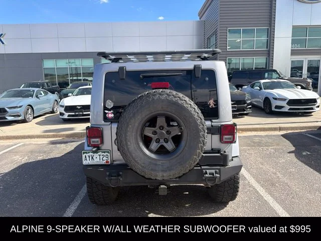 Used 2018 Silver Jeep Unlimited Altitude image 6