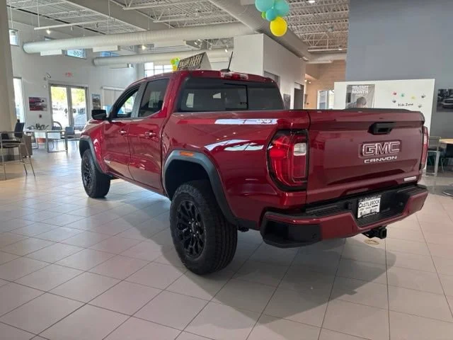 New 2026 Volcanic Red Tintcoat GMC Elevation image 3