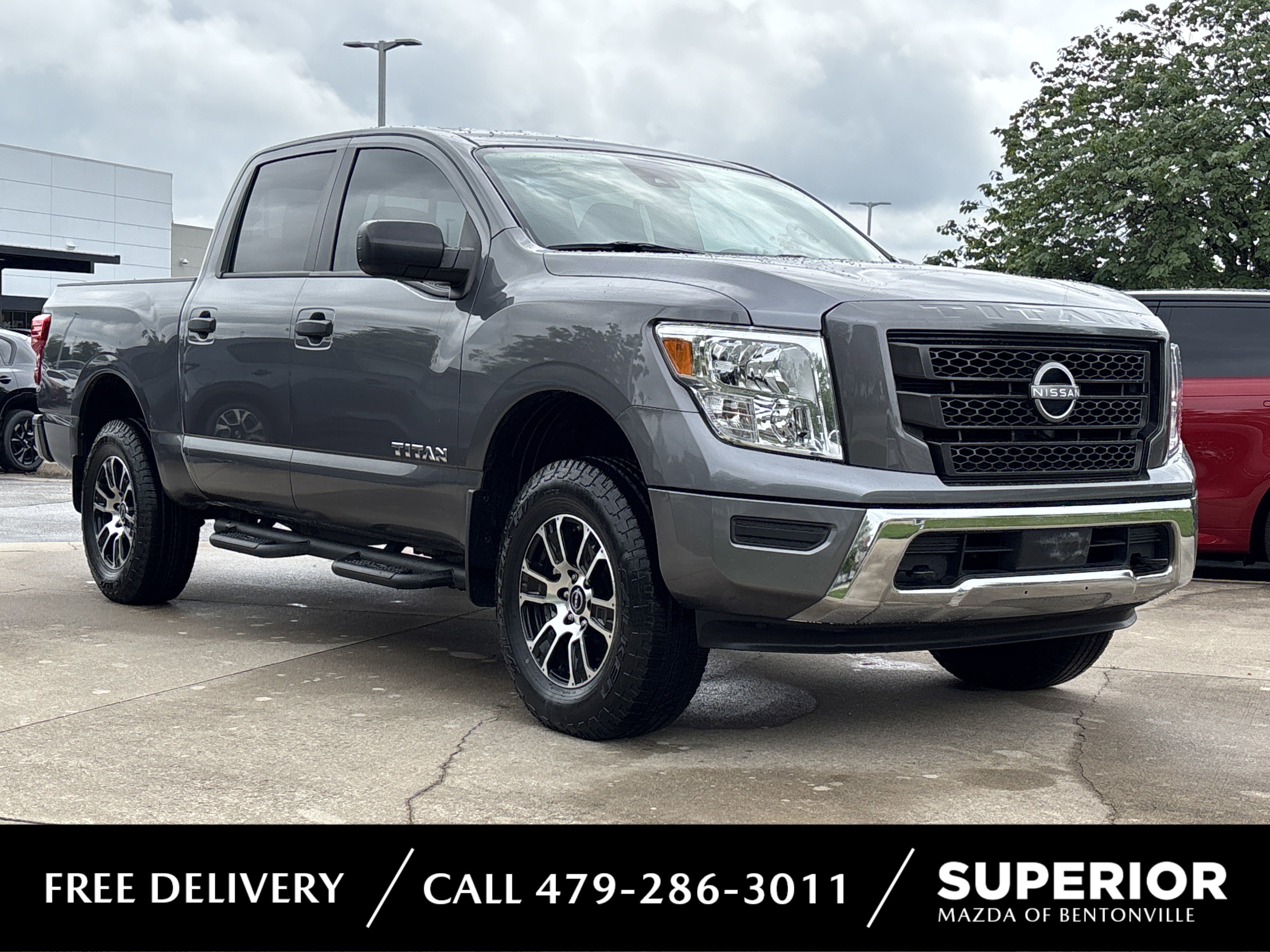 Pre-Owned 2024 Nissan Titan SV 4WD Crew Cab Pickup in Bentonville
