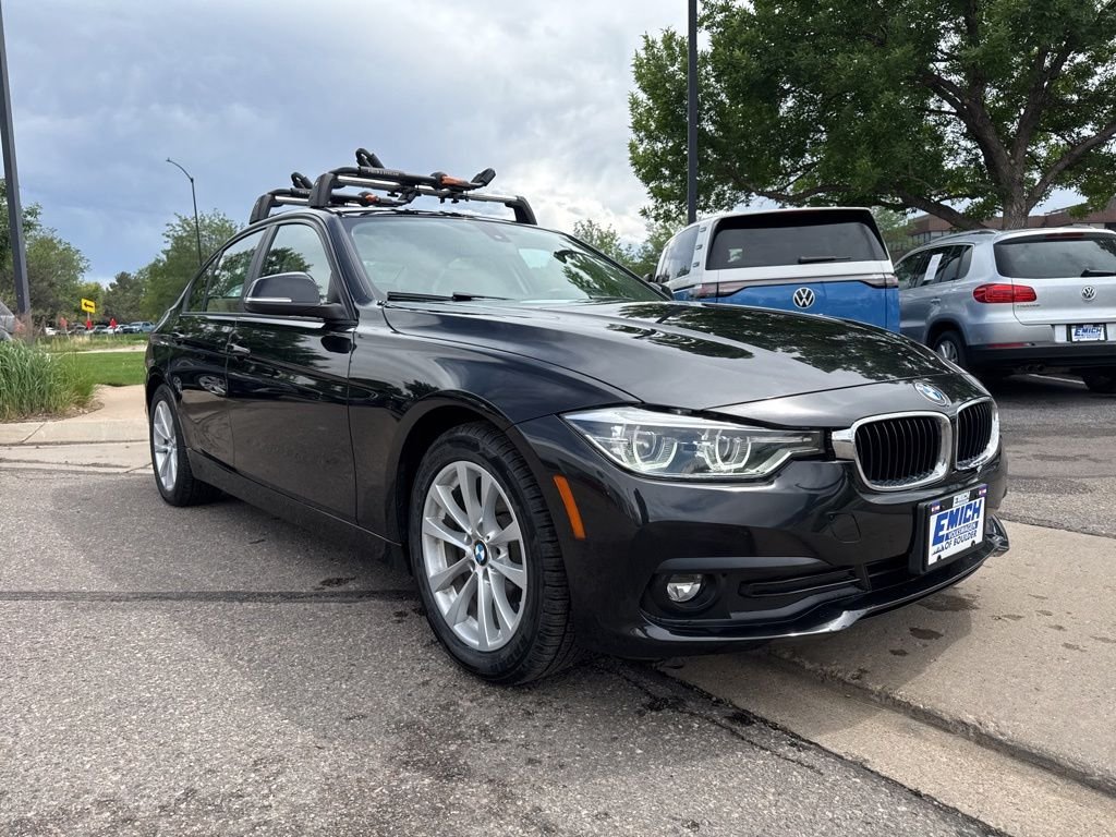 Used 2018 Black Sapphire Metallic BMW 320i xDrive image 7